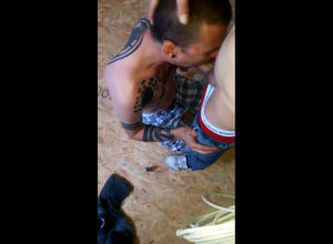 Tatted homo victim fellate on knees