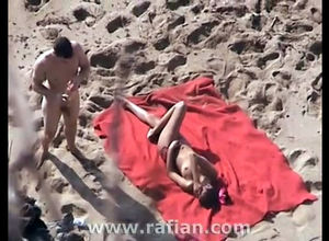 Naked beach romping caught on spycam