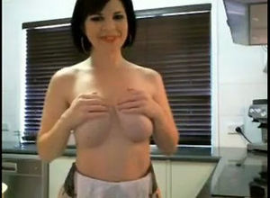 Huge-chested Mummy nude on a kitchen